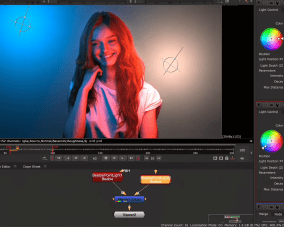 A young woman with long, flowing red hair smiles warmly, set against a backdrop of vibrant blue and pink lighting. She wears a simple white T-shirt. The image also features a color correction interface showcasing settings for light position and intensity, enhancing the creative atmosphere.